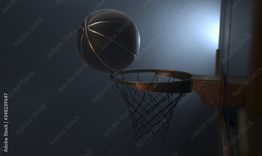 An action shot of a black and gold basketball teetering on the rim of a regular basketball hoop dramatically spotlit from behind on an isolated dark background - 3D render