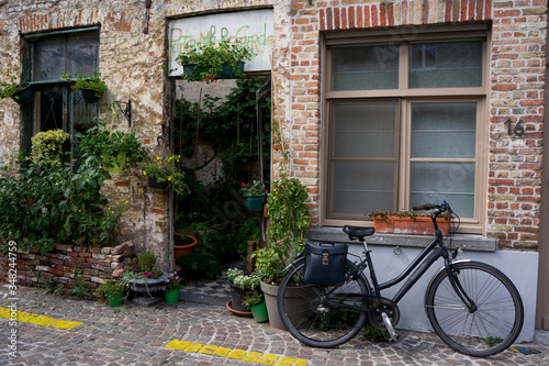 old bicycle in front of an oldhouse
