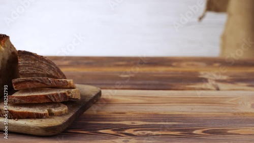 Wooden bread boards with various types of sliced bread. photo