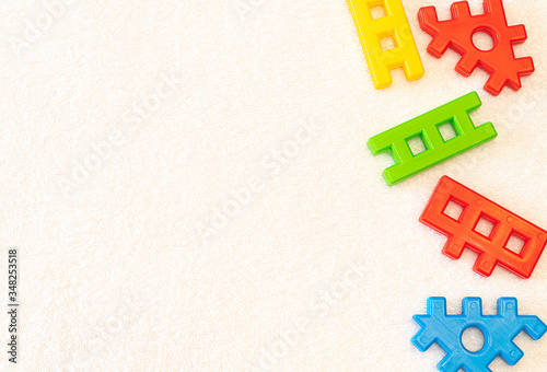 Obraz na plátně Multicolored tinker toys with copy space