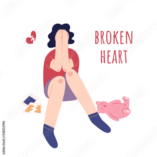 Teenage problem concept. Broken heart. Girl sitting and crying near a teddy bear and photos. She depressed about breaking up or unrequited love.  Vector flat cartoon illustration