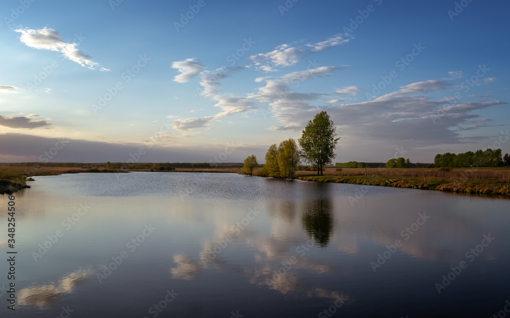 may landscape on the river Bank with trees, Russia, Ural, spring may