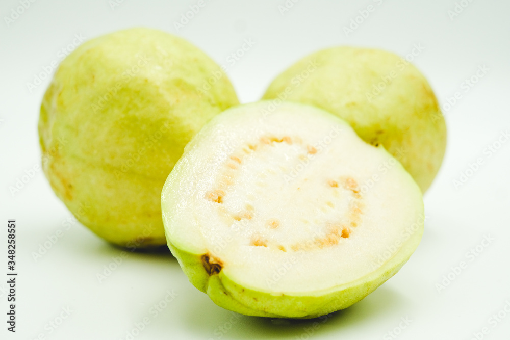 Guava, tropical fruits originated from Malaysia, shot on a white isolated background.