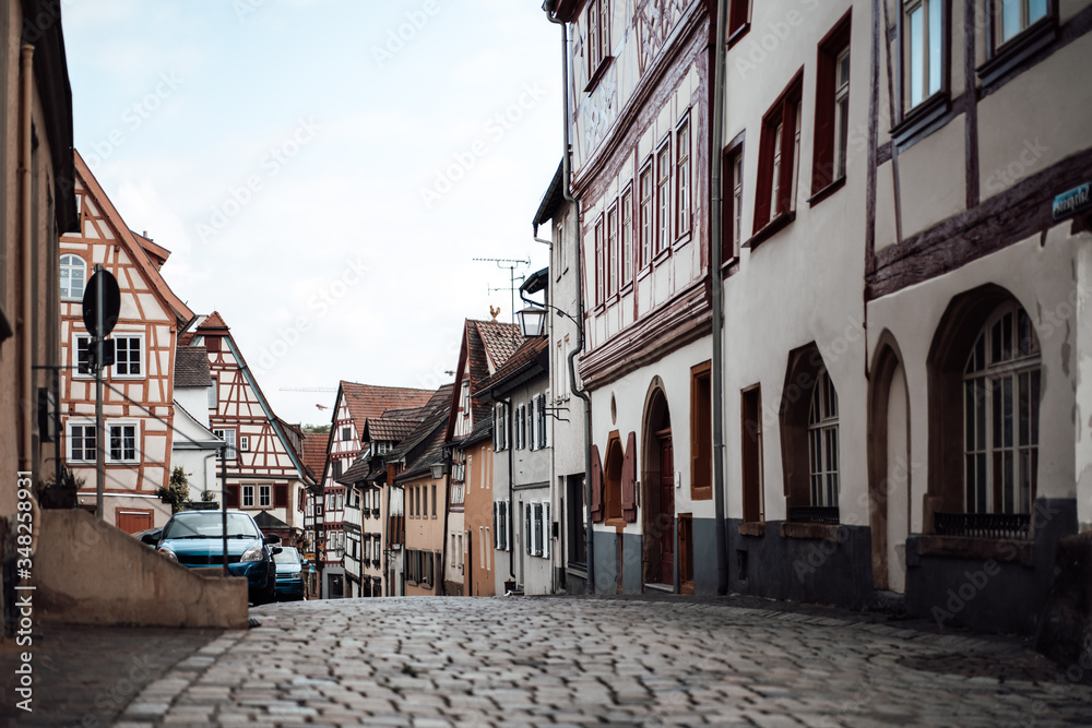 photo of old houses on the side of the street