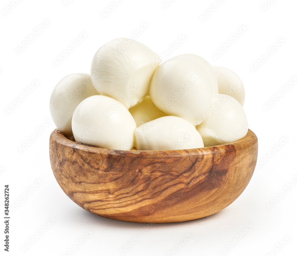Mozarella balls in wooden bowl isolated on white background. Close up o Mozarella balls in wooden bowl isolated on white background. Close up o