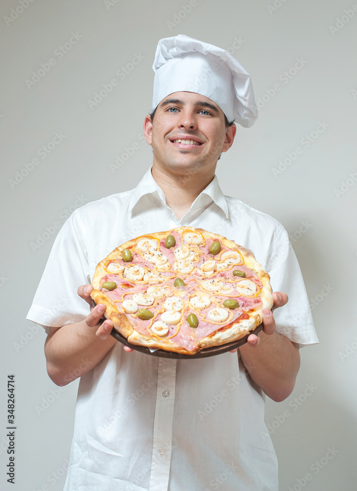 portrait cook with pizza on a light background