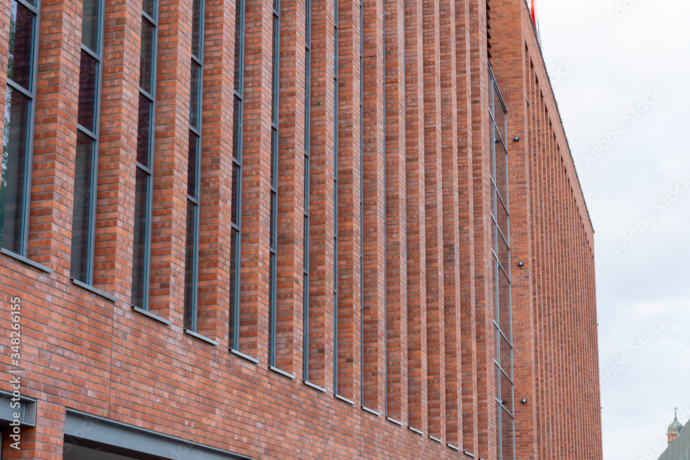 A modern brick building that houses many companies A modern brick building that houses many companies