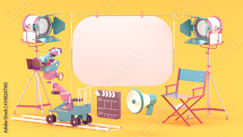 The white screen is surrounded by a movie camera, a spot light, a chair and a megaphone on a orange studio.-3d rendering..