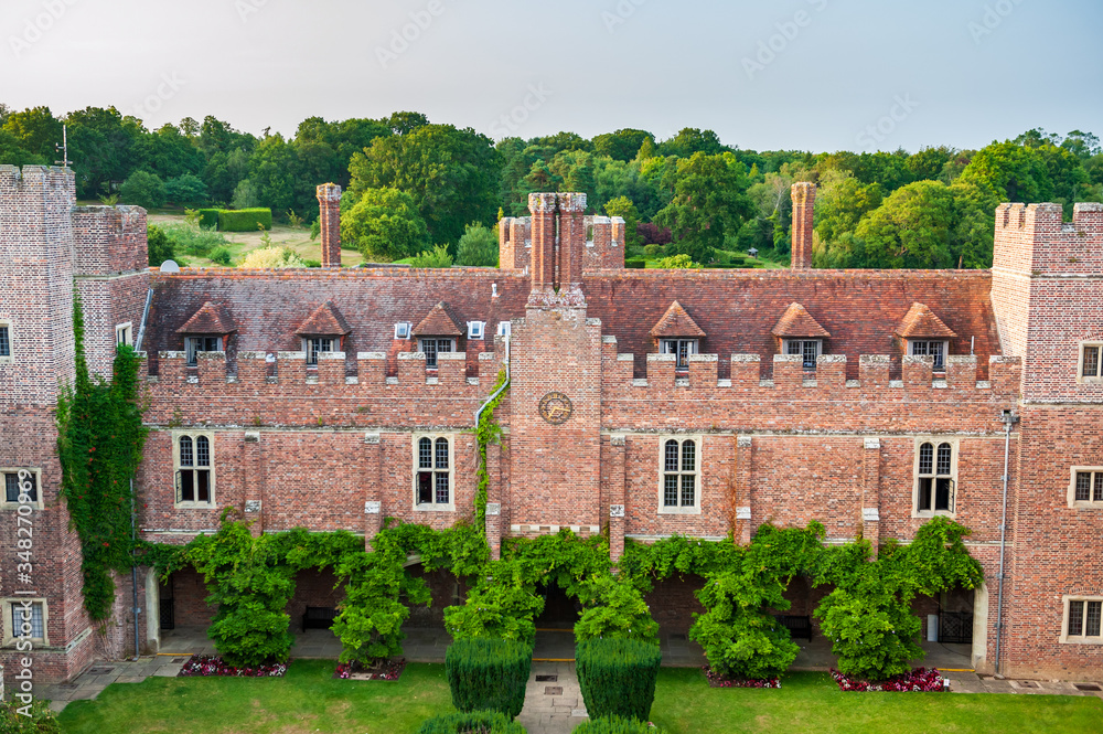 Aerial view of Herstmonceux garden, East Sussex, England. Brick Herstmonceux castle in England (East Sussex) 15th century. View of a moated brick castle in Southern England.