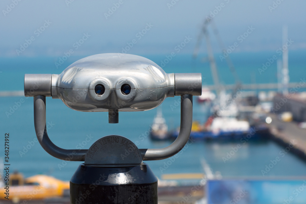 Hi spy viewing mashines. Binoculars on the observation place in the seaport.