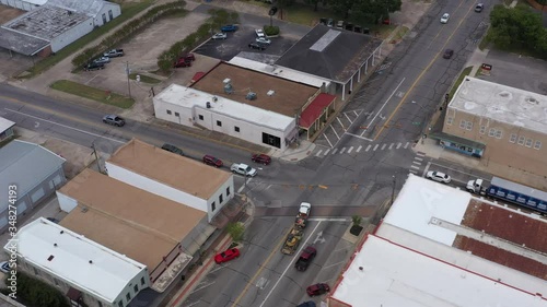 Tracking a red SUV through downtown, Navasota, Texas, USA photo