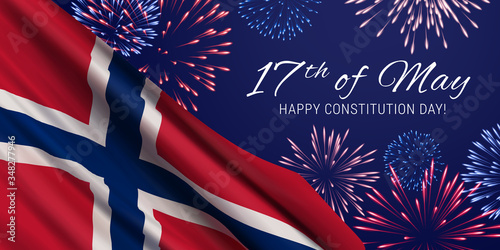 Vector illustration with a realistic flag of Norway, fireworks, and text on dark blue background. Vector element for Norwegian Constitution Day (National Day) May 17th.
