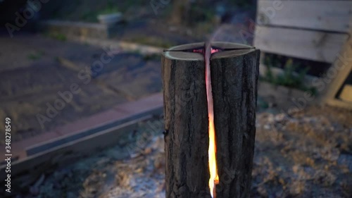 Burn swedish torch in the camp