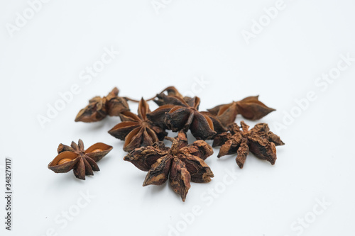Star Anise or Bunga Lawang shot on a white isolated background.