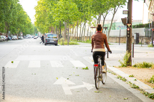 young woman riding a bike