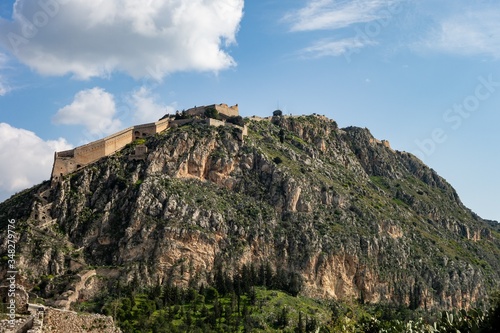 Fortress of Palamidi on a high rocky hill in Nafplio, Greece with a castle wall