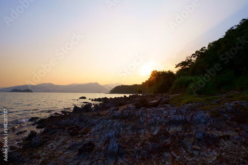 sunset at the coast. Sam Mun Tsai, Yim Tin Tsai, Tai Po, Hong Kong. Hong Kong UNESCO Global Geopark.