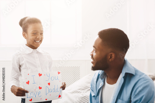 I Love You, Dad! Cute Girl Holding Greeting Card For Father
