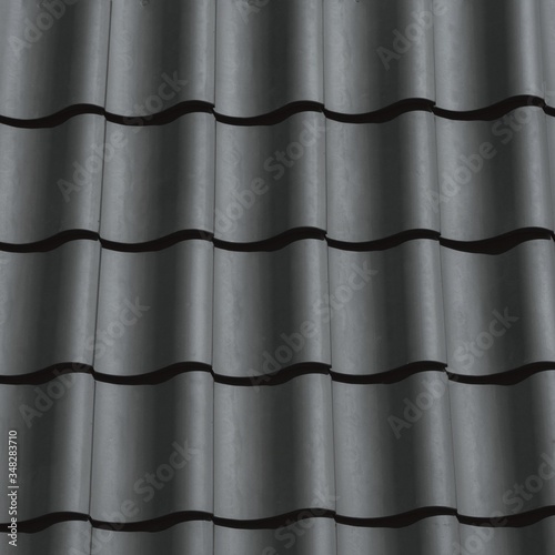 Matte black clay pantile texture photo