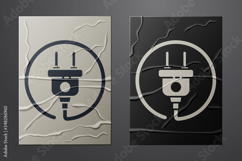 White Electric plug icon isolated on crumpled paper background. Concept of connection and disconnection of the electricity. Paper art style. Vector