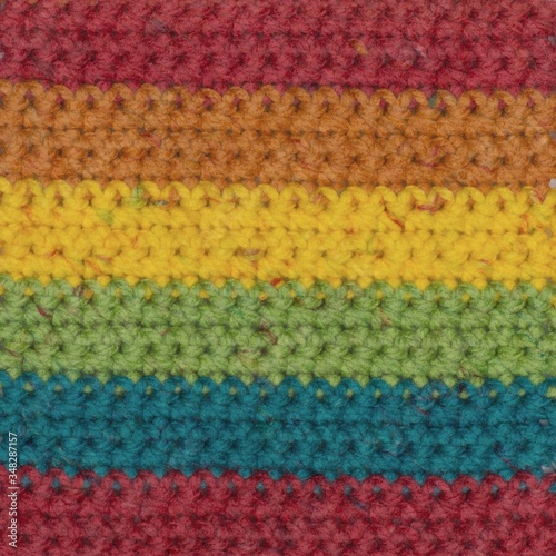 Rainbow colored acrylic yarn texture © Inna