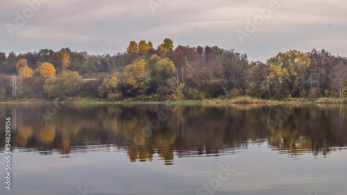 Autumn landscape with a river © Andrey