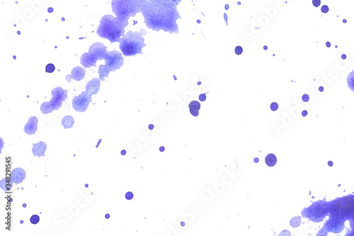 Abstract Flicked Blue and Purple Paint and Ink on White Paper For Background