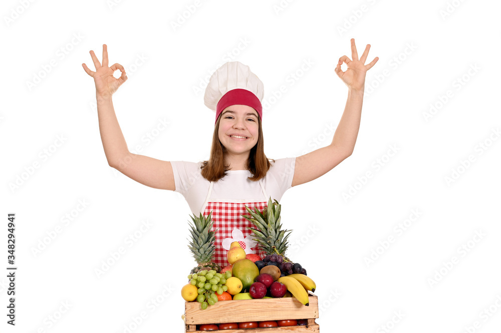 happy female cook with different fruit and ok hand sign happy female cook with different fruit and ok hand sign
