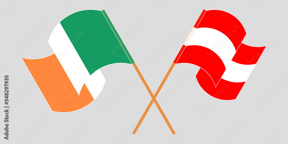 Crossed and waving flags of Ireland and Austria Crossed and waving flags of Ireland and Austria