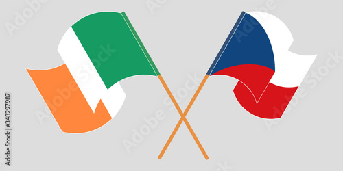 Crossed and waving flags of Ireland and Czech Republic