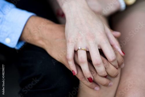 close up of hands holding each other