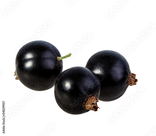 Black currants isolated on white background with clipping path