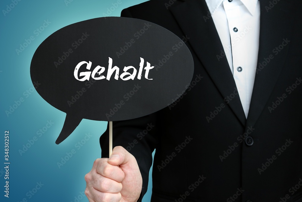 Gehalt. Anwalt hält Sprechblase mit Text in der Hand. Mann zeigt Schild mit Beschriftung. Konzept für Recht, Gesetz, Rechtsprechung Gehalt. Anwalt hält Sprechblase mit Text in der Hand. Mann zeigt Schild mit Beschriftung. Konzept für Recht, Gesetz, Rechtsprechung