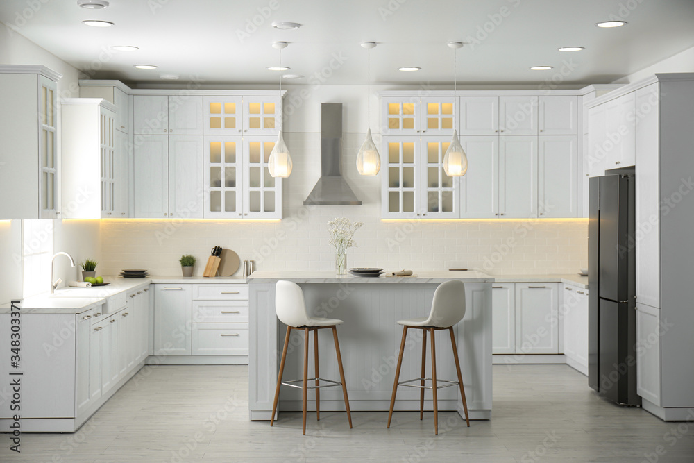 Beautiful kitchen interior with new stylish furniture Beautiful kitchen interior with new stylish furniture