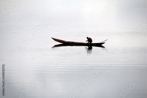 fisherman on lake in Africa