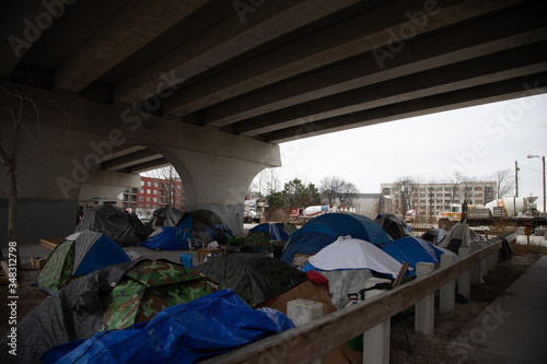 Homeless camp under bridge no sign