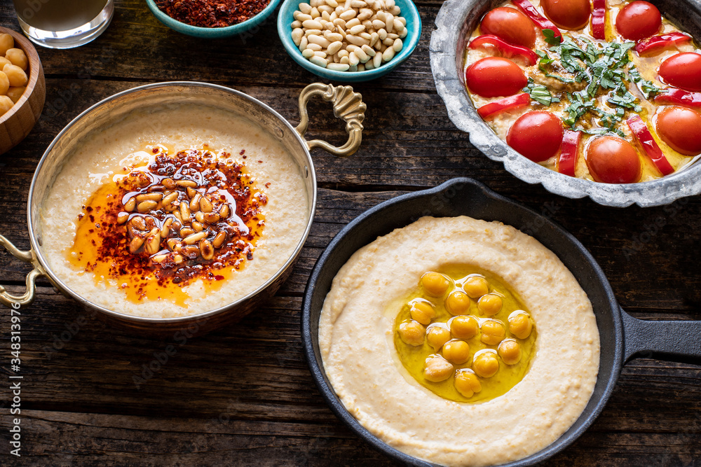 Hummus (Middle East food) on the table with top view.