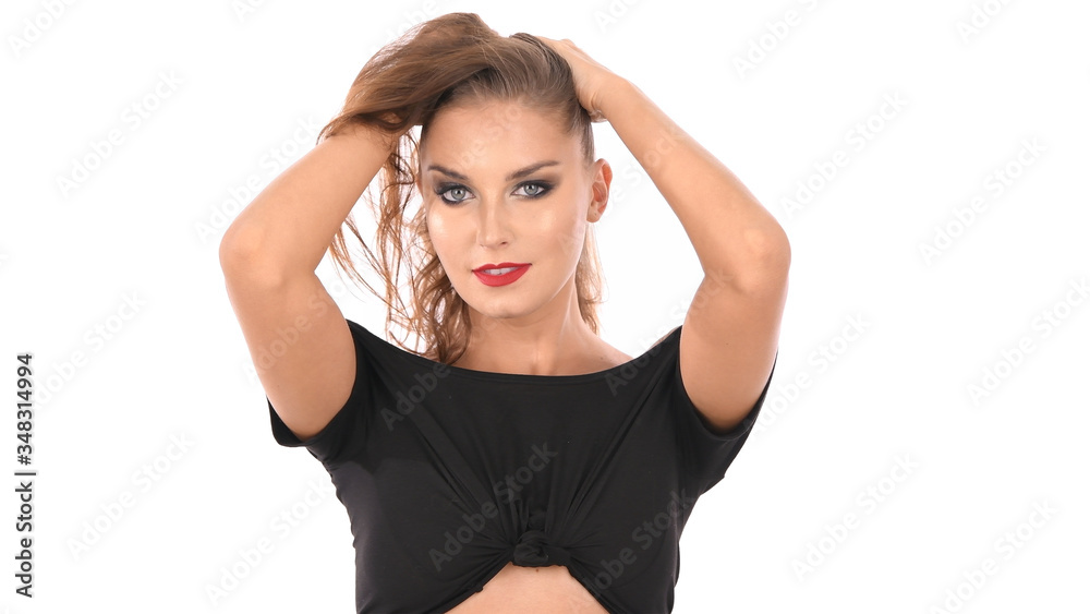 Beauty concept. The girl is showing seductive posture on a white background. 4k Resolution. Beauty concept. The girl is showing seductive posture on a white background. 4k Resolution.
