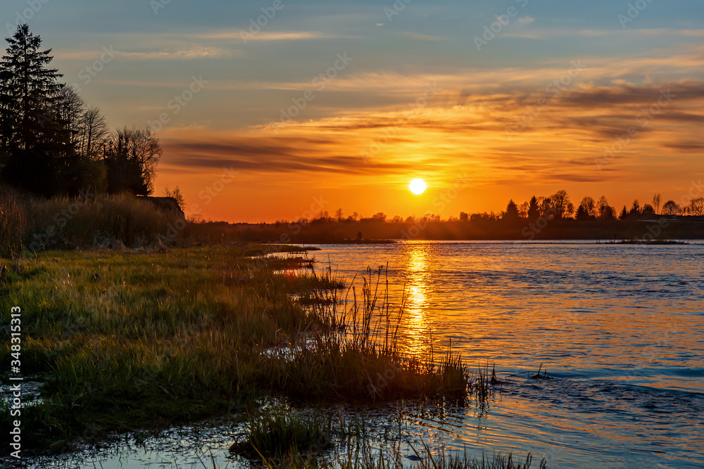 Fototapeta premium Sunset on the river. Pskov region Russia