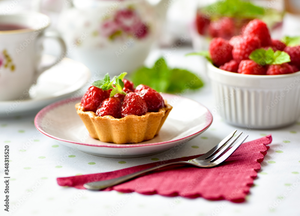 Fruit raspberry cakes on a table Fruit raspberry cakes on a table