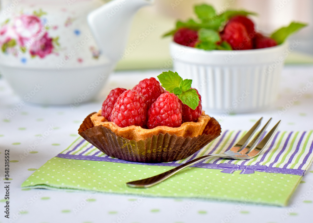 Fruit raspberry cakes on a table Fruit raspberry cakes on a table