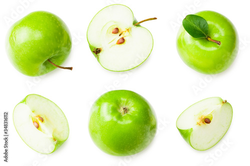 green apples with slices isolated on white background. top view