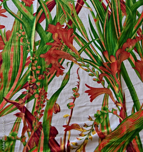 floral designer, white bedsheet with leaves and flowers.