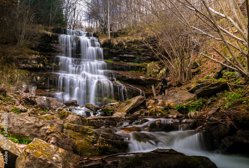 Fototapeta Naklejka Na Ścianę i Meble -  Waterfall in a forest on mountain. Called Tupavica waterfall on old mountain (stara planina) near the village Dojkinci in Serbia