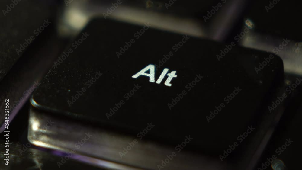 Close-up Alt button macro shooting the led light blue and red buttons keyboard