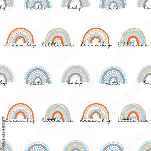 Fototapeta Naklejka Na Ścianę i Meble -  Seamless pattern of hand drawn boho rainbow in pastel blue and neutral beige colors on white background
