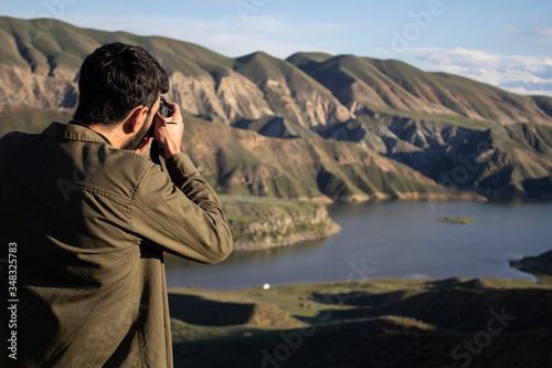 Wallpaper Mural the photographer in mountain background Torontodigital.ca