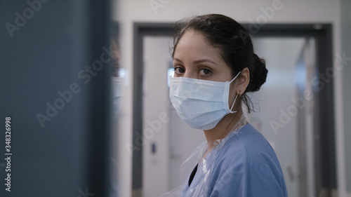 Portrait of nurse with mask in the ER during coronavirus pandemic