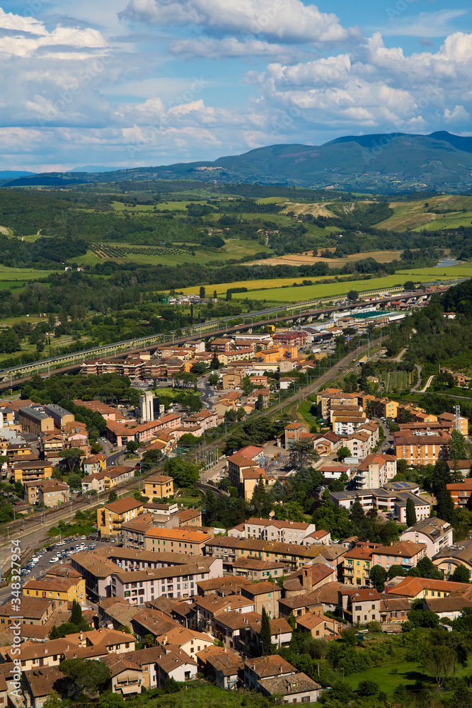Vertical view of Orvieto on a partly cloudy day. Orvieto is a hill town in the Tuscany region of Italy.

