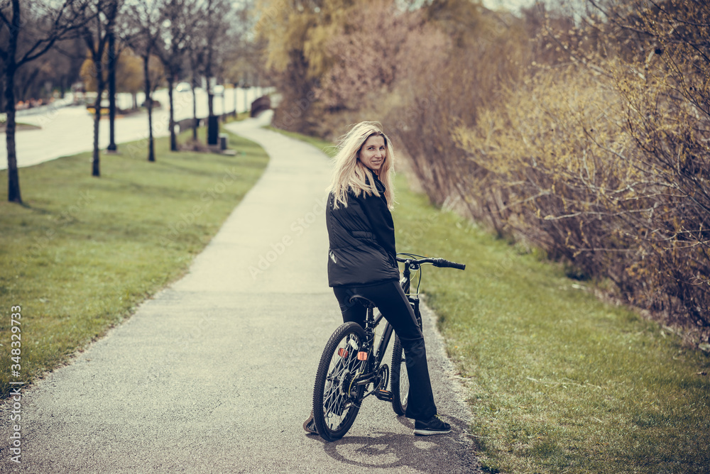 Portrait of a girl on a bike